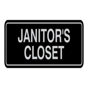 Clear "Janitor Closet" sign on a utility door in a Lagos office building.