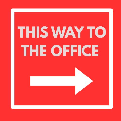 Bright "This Way to Our Office" sign in a Lagos business center.