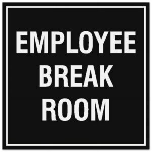 Directional "Employee Break Room ->" sign in a Lagos office space.