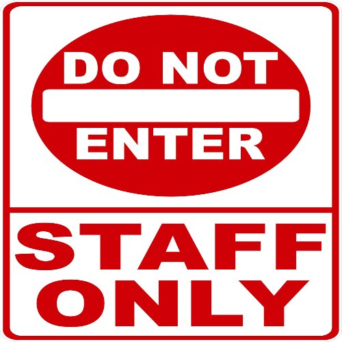 Clear "For Staff Only" sign in a Lagos commercial space.