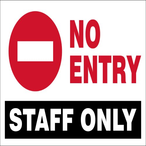 Custom "Staff Only" sign with company logo in a Lagos office.