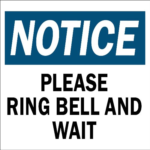Countertop "Please Ring Bell And Wait" sign for service in a Lagos pharmacy.