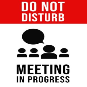 Clear "Do Not Disturb-Meeting In Progress" sign for a confidential meeting in Lagos.