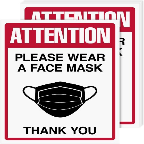 Wall-mounted face mask required sign in hospital