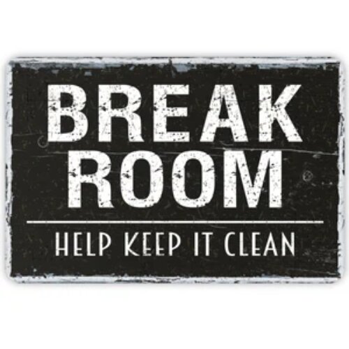 Informative "Break Room - Please Keep Clean" sign in a Nigerian workplace.