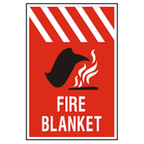 Red "Fire Blanket" sign prominently displayed in a Lagos commercial kitchen.