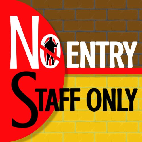 Multicolor "No Entry-Staff Only" sign on a door in a Lagos office building.