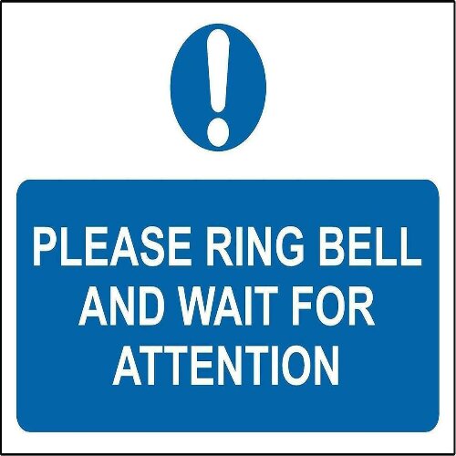 Bright "Ring Bell And Wait for Attention" sign at a clinic reception in Nigeria.