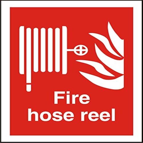 Red "Fire Hose Reel" sign prominently displayed in a Lagos commercial building.