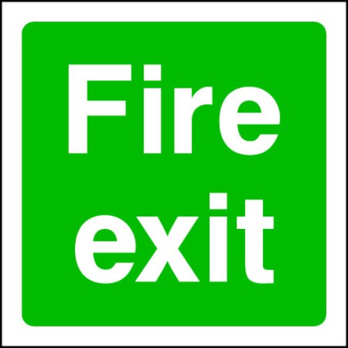 Exit Fire sign on a fire-rated door in a Nigerian high-rise.