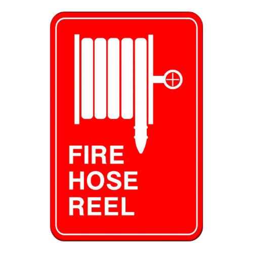 "Fire Hose Reel" sign near a water source in an industrial setting in Nigeria.