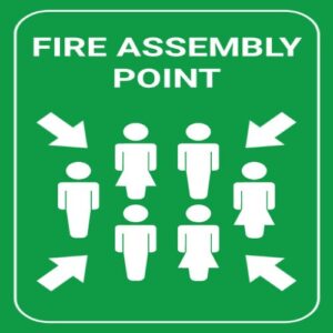 Clear Assembly Point sign with people pictogram for evacuation in Nigeria.