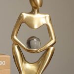Order golden figurines online in Lagos
