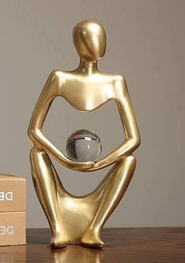 Order golden figurines online in Lagos
